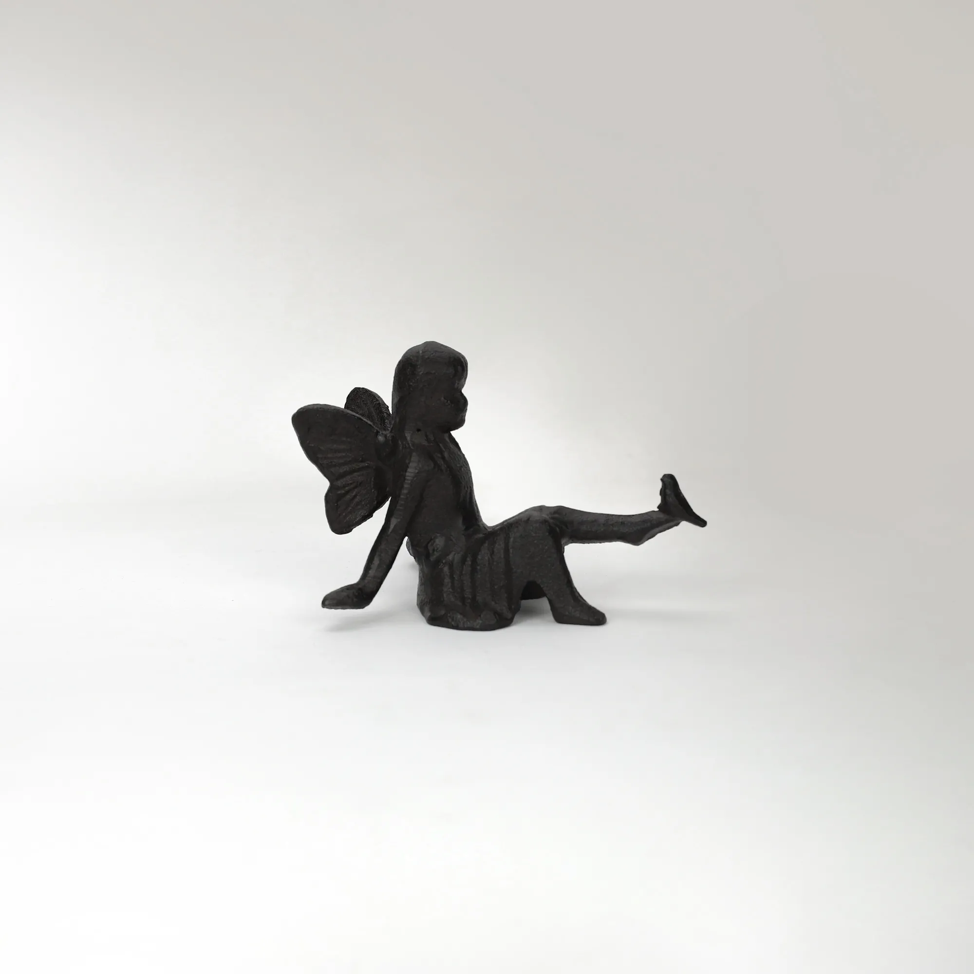 Engelchen-Skulptur, aus Gusseisen, B 9 cm, T 13 cm, H 8,5 cm